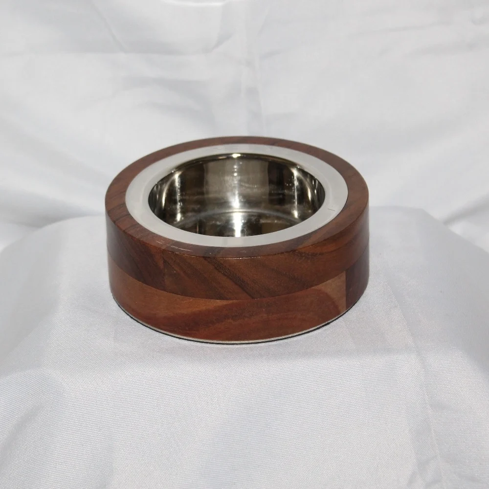 West Elm solid acacia wood bowl with metal alloy bowl in a Silver finish.
